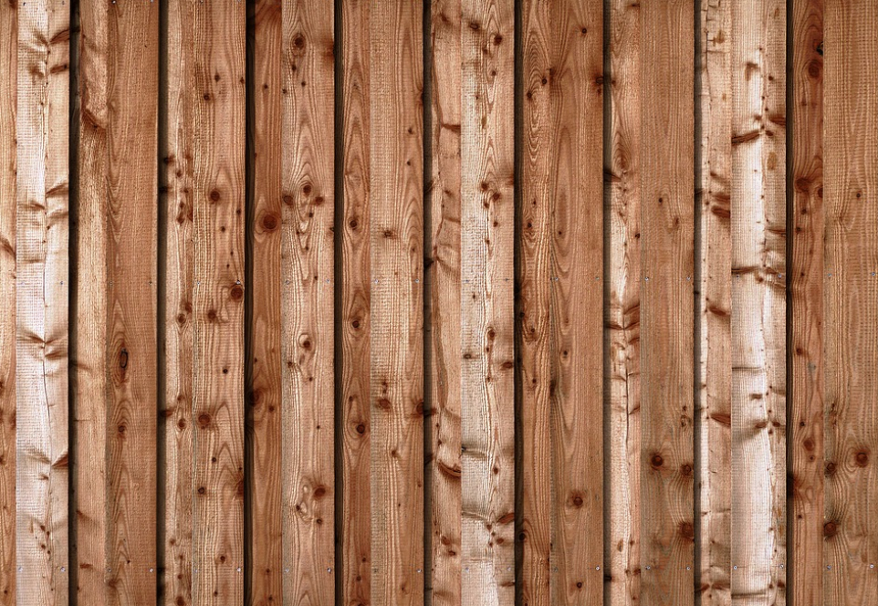 this image shows redwood fence in Broomfield, Colorado